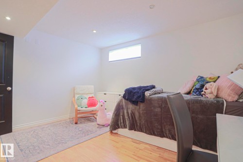Wood-finish flooring with white wall finishes - 2 Hillview Crescent, Sherwood Park, AB 