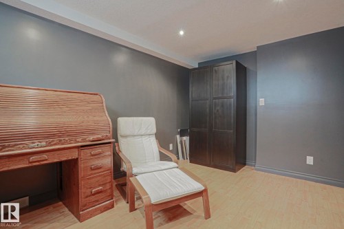 Recessed ceiling lighting, crown molding, and light wood-finish flooring - 2 Hillview Crescent, Sherwood Park, AB 