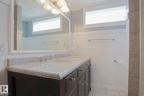 Double vanity with integrated sinks and granite countertop - 2 Hillview Crescent, Sherwood Park, AB 