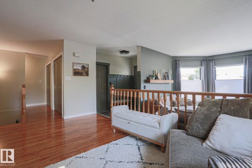 Wood-finish flooring throughout the hallway - 2 Hillview Crescent, Sherwood Park, AB 
