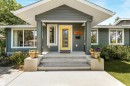 Contemporary exterior with horizontal siding, a prominent entryway, a vibrant yellow front door, and a concrete porch with steps - 8212 148 Street Nw, Edmonton, AB 