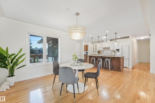 Wood-finish flooring throughout - 8212 148 Street Nw, Edmonton, AB 