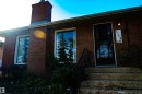 Brick exterior with a prominent brick chimney - 11119 137 Avenue Nw, Edmonton, AB 