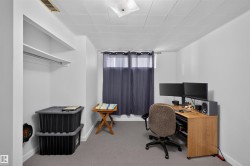 Recessed closet with a hanging rod and shelving - 