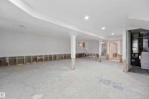Spacious room with recessed lighting and exposed wall framing - 13420 117 Avenue Nw, Edmonton, AB 