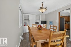 Recessed wall cabinetry with clear glass door fronts - 