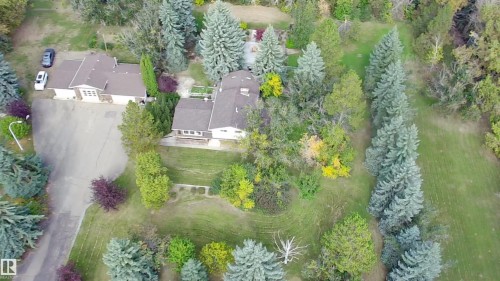 Expansive property with mature landscaping and established coniferous trees - #74 22555 Twp Road 530, Rural Strathcona County, AB 
