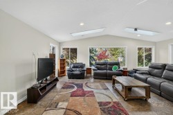 Vaulted ceiling with skylights and recessed lighting - 