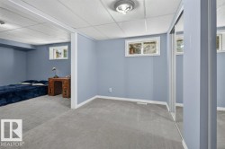 Carpeted flooring, recessed lighting, and multiple windows - 