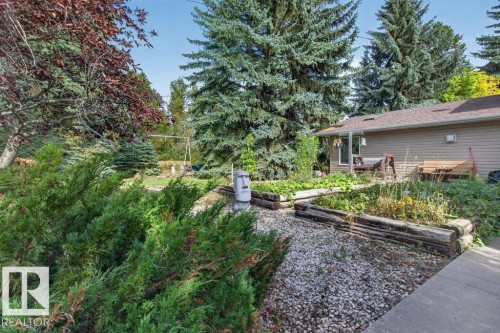 Established landscaping with mature trees - #74 22555 Twp Road 530, Rural Strathcona County, AB 