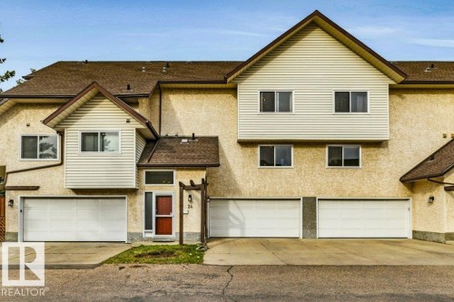 Stucco exterior with gabled roof lines - #24 3811 85 St Nw, Edmonton, AB 