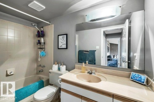Built-in bathtub with tiled surround - #24 3811 85 St Nw, Edmonton, AB 