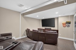 Integrated media console with a wall-mounted display - 