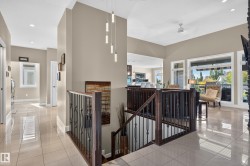 Tile flooring extending through the entry and hallway - 