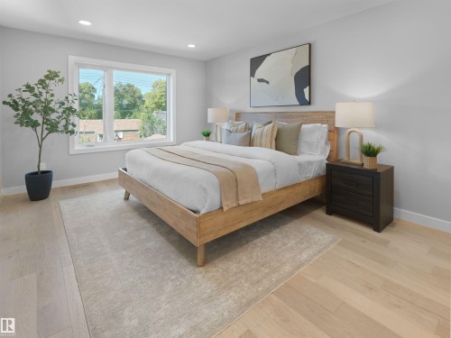 Recessed lighting, light wood-finish flooring, and a large window - 9118 89 Street Nw, Edmonton, AB 
