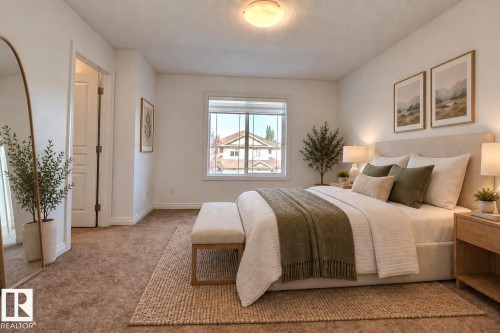 Neutral-toned wall paint, window with blinds, carpeted flooring, white trim, and a flush-mount ceiling light fixture - 5205 168 Avenue Nw, Edmonton, AB 