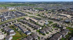 Expansive residential development featuring detached homes and townhouses - 