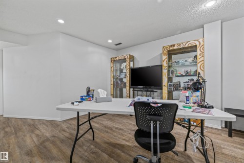 Recessed ceiling lighting, wood-finish flooring, and white walls - #63 501 Youville Dr E Nw, Edmonton, AB 