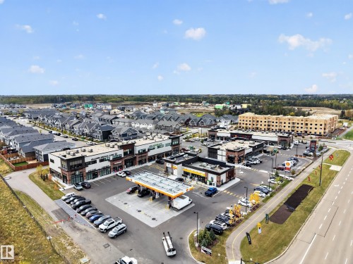 Mixed-use development featuring commercial retail spaces, a service station, and surface parking - 209 Hampshire, Sherwood Park, AB 
