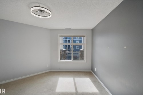 Window with white trim - #208 16035 132 St Nw, Edmonton, AB 