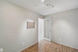 Wood-finish flooring with neutral wall paint - 