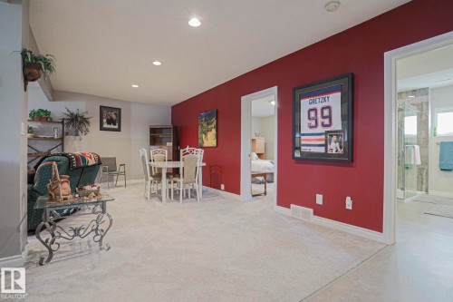 Recessed lighting illuminates the carpeted floor - 3815 41 Street Nw, Edmonton, AB 