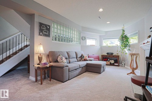 Recessed lighting, light-toned carpeting, and glass block windows - 3815 41 Street Nw, Edmonton, AB 