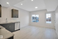 Kitchenette with dark wood-finish cabinetry, stainless steel dishwasher, and white subway tile backsplash - 
