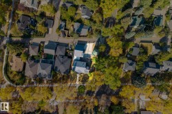 Aerial view of property's location featuring nearby suburban area - 