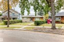 Brick and stucco exterior with a covered entry - 10715 133 Street Nw, Edmonton, AB 