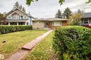 Brick and stucco exterior with multiple windows - 10715 133 Street Nw, Edmonton, AB 