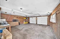 Two white garage doors - 