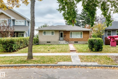 Brick and stucco exterior with a gabled roof - 10715 133 Street Nw, Edmonton, AB 