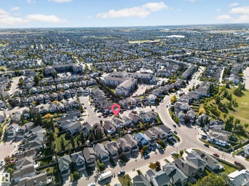 Expansive residential neighborhood with varied housing styles, mature trees, and local roadways - 7836 7 Ave Sw Sw, Edmonton, AB 