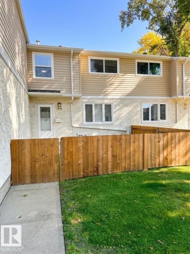 Two-story exterior with vinyl siding and stucco finishes - 9G Clareview Village Nw, Edmonton, AB 