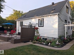 Multi-level wood-finish deck with privacy lattice - 