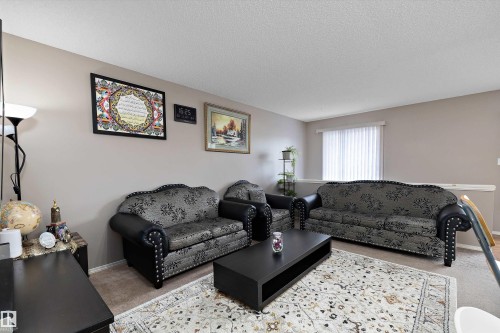 Neutral wall paint with carpet flooring - 3114 32 Avenue Nw, Edmonton, AB 