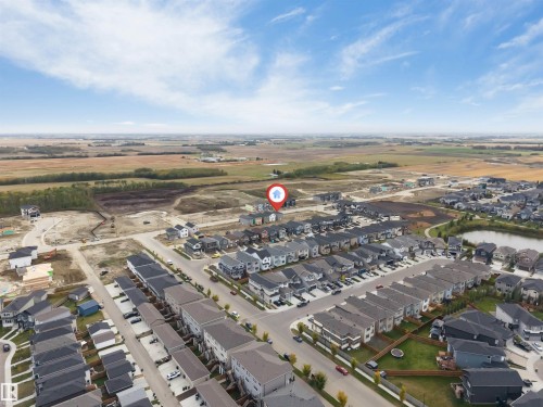 Aerial perspective of a residential community with varied architectural styles - 523 Robinson Blvd, Leduc, AB 