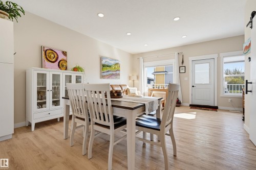 Recessed ceiling lighting illuminates the light-toned walls and wood-finish flooring - #3 150 Everitt Dr N, St. Albert, AB 