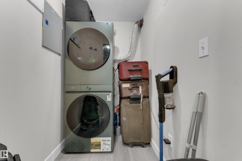 Stackable laundry appliances with front-loading design - #113 2508 50 St Nw, Edmonton, AB 