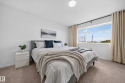 Recessed lighting fixture, light-colored carpeting, large window with ample natural light, white painted walls, window with curtain rods - 