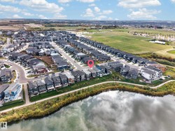Waterfront property with direct access to a paved pathway - 