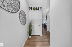 Wood-finish flooring with white trim - 