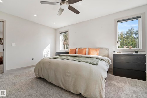 Recessed lighting, ceiling fan, and carpeted flooring - 49279 Rge Rd 240, Rural Leduc County, AB 
