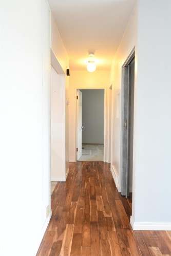 Three bedrooms are served by the hallway, and are set away from the family and social spaces.  Two more bedrooms are found downstairs, and those even have a Jack & Jill pocket door between them - 10243 42 Street Nw, Edmonton, AB 