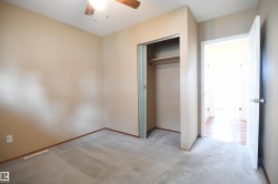 Both the second and third main floor bedrooms are nicely sized, with good closets, and the same upgraded vinyl windows found throughout the main floor - 