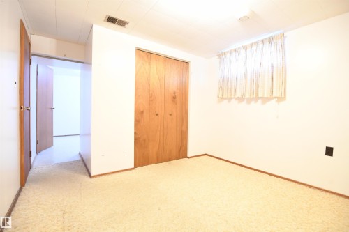 The 4th and 5th basement bedrooms are set away from the family room, and also have an optional "Jack & Jill" pocket door between them.  Clearly, this will continue to be a great family home - 10243 42 Street Nw, Edmonton, AB 