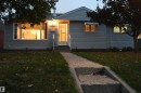 Outstanding value in this 3+2 bedroom bungalow with a gas fireplace, huge rec room, heated oversized garage with 220V, upgraded vinyl windows, recent shingles, high efficiency furnace, all on a quiet street, backing onto the park and ravine in Gold Bar - 10243 42 Street Nw, Edmonton, AB 