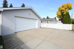 The garage is oversized, insulated, and has a new Reznor heater installed.  Full driveway in front of the garage is great for additional parking or projects, and the 220V plug in the garage is perfect for anyone with hobby or tool needs, or an EV charger - 