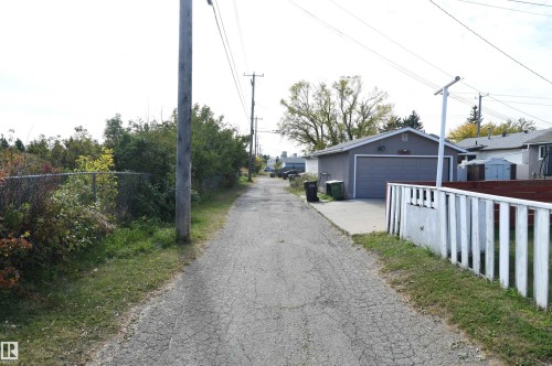 The rear lane backs onto the ravine that connects to Gold Bar Park.  Quiet, with no through traffic, this is a great family location - 10243 42 Street Nw, Edmonton, AB 